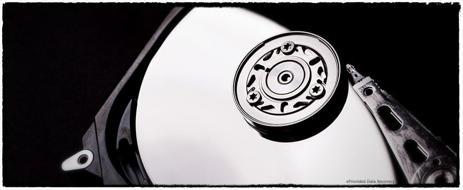 A Hard Drive Internals Photo. Inside a Hard Drive, Moving Parts, Heads and Platters.